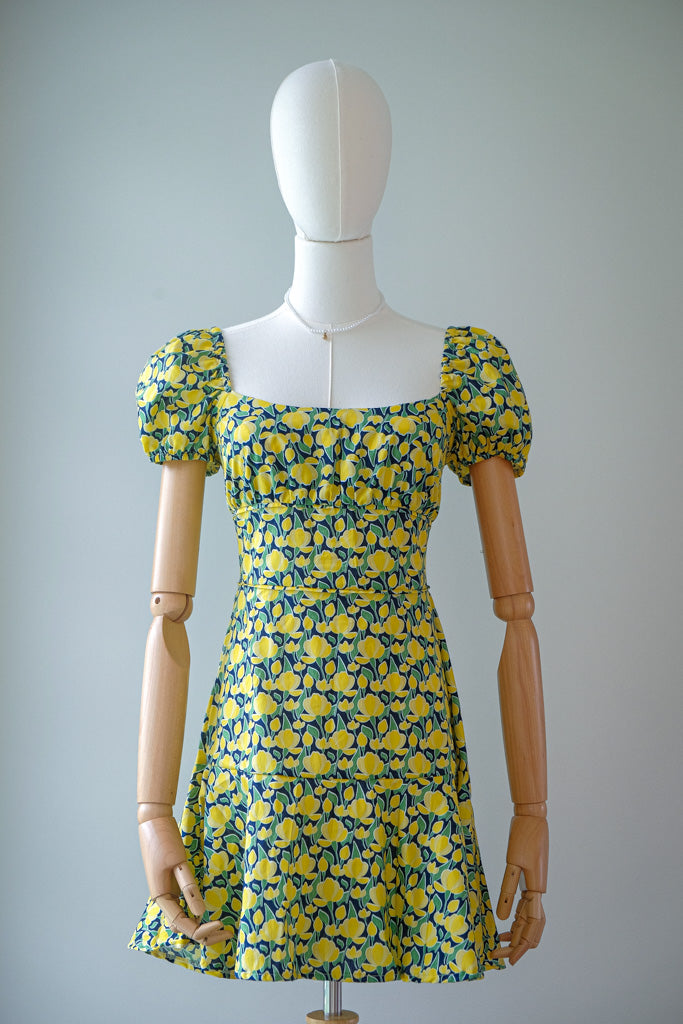 The Suri Mini dress - yellow floral